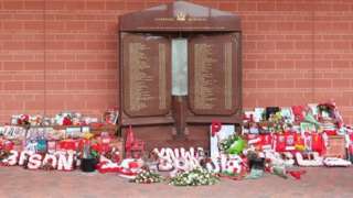 Flowers and tributes left at the Hillsborough Memorial