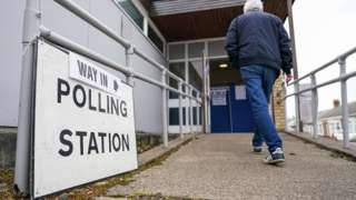 Man walks into a polling station in Sunderland
