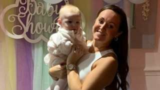 Fiona George Williams holding Violet