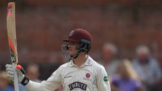 Abell raising bat