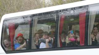Young coach passengers