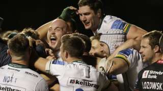 London Irish celebrate at full-time as they draw with Saracens