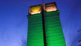 Grenfell Tower covered with green sheeting