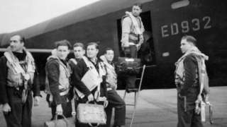 Guy Gibson, with his crew as they board their Avro Lancaster III ED932/AJ-G