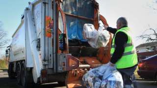 Bin contractor collects recycled waste material