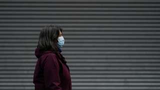Woman in mask in Middlesbrough