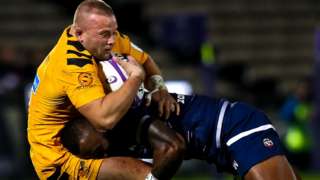 Tom Cruse of Wasps is tackled in his side's defeat against Bordeaux