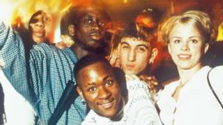Clubbers pose for the camera at Bagleys, London, 1996