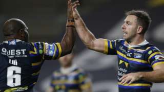 Leeds Rhinos' Luke Gale celebrates scoring their second try with Rob Lui