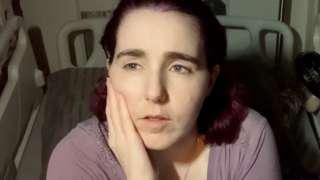 Charlotte in her hospital bed