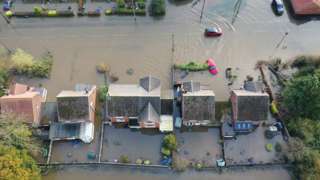 Aerial picture of homes and gardens flooded
