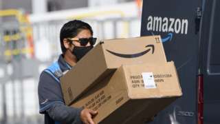 Amazon staff delivering parcels