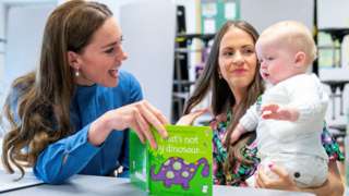 Kate meets Laura Molloy and her 10-month-old son Saul Molloy during the Roots of Empathy session at St John's Primary School