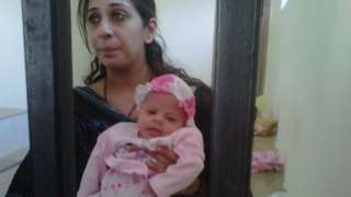Khadija Shah with her baby