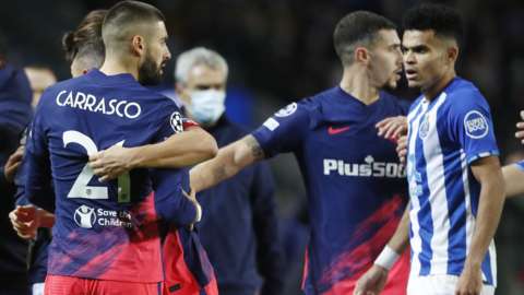 Porto and Atletico Madrid players clash