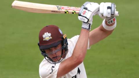 Jamie Smith in batting action for Surrey