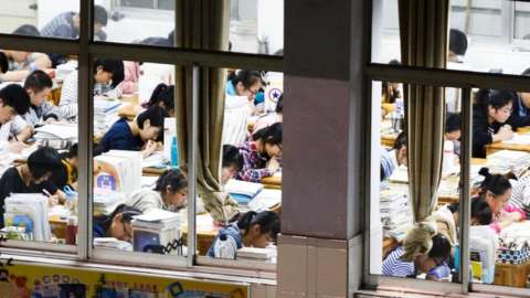 Senior high school students studying at night to prepare for the college entrance exams