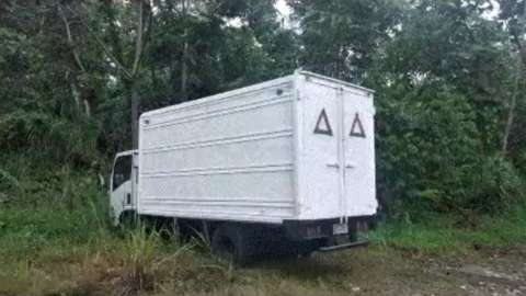 A lorry allegedly used to steal 2.8t of drugs is seen in a photo released by Ecuadorean police