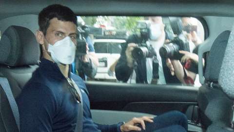 Serbian tennis player Novak Djokovic heads to the hearing on Sunday