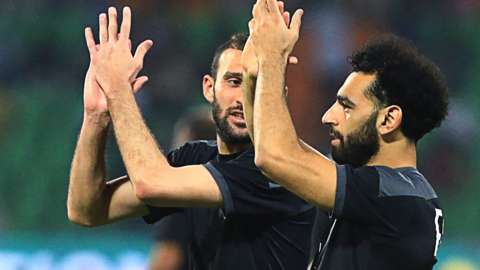 Mohamed Salah (right) applauds fans
