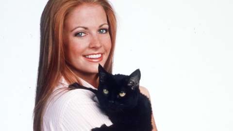 Melissa Joan Hart and Salem the cat pictured in a promo image from the show in 2000