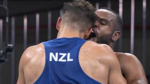Boxer Youness Baalla tries to bite opponent David Nyika