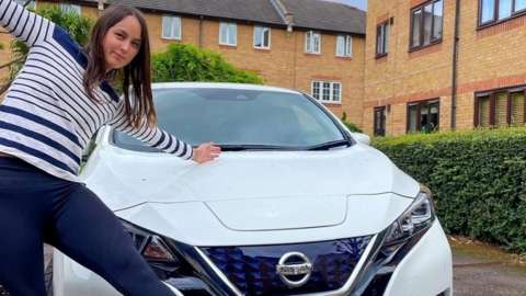 May Lang with her Nissan Leaf