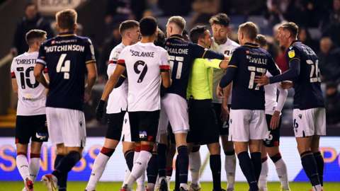 Millwall and Bournemouth players clash