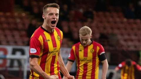 Partick Thistle defender Lewis Mayo celebrates his goal at Firhill