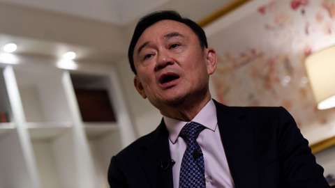 Deposed former Thai premier Thaksin Shinawatra speaks during an interview in New York, on March 9, 2016