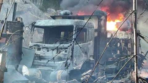 A burning lorry after the reported attack in Hpruso, eastern Myanmar