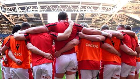 Wales players huddle