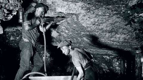 Miners using a pneumatic drill, Rhondda Valley, South Wales, 25 June 1931