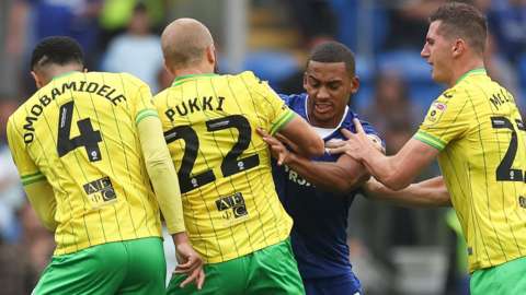 Cardiff and Norwich players clash