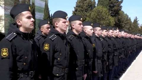 Still from video of sailors said to be crew members of the Moskva
