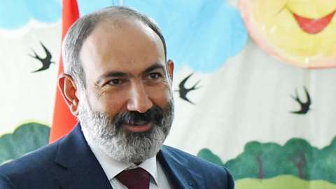 Nikol Pashinyan casts his vote at a polling station during the snap parliamentary election in Yerevan, Armenia, on 20 June 2021