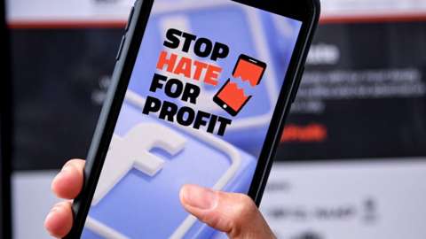 A smartphone showing the website of campaign group Stop Hate For Profit