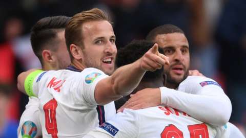 England players celebrate after scoring their first goal against Germany