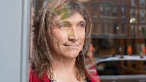 Vermont Democratic Party gubernatorial primary candidate Christine Hallquist, a transgender woman, poses on College Street in Burlington, Vermont