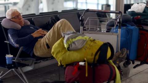 Sleepy passenger at Heathrow