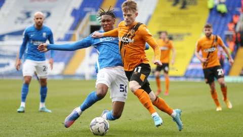 Keane Lewis-Potter (right) in action for Hull against Birmingham City