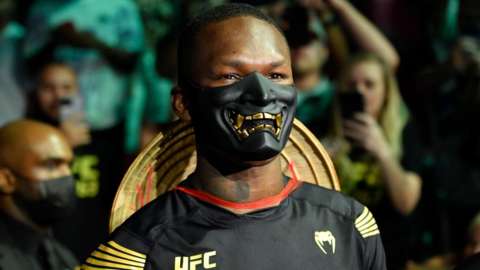Israel Adesanya dressed up as Mortal Kombat fighter Raiden