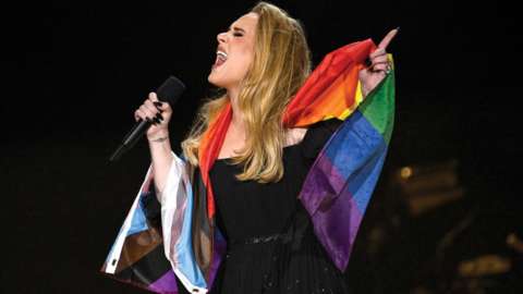 Adele with Dean's £8 flag from a stall at Holborn station