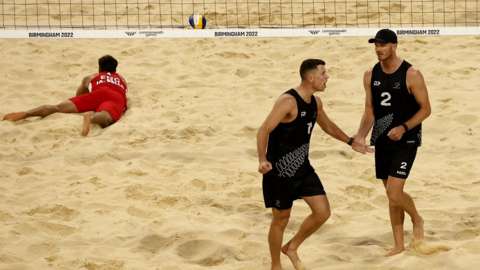 New Zealand duo Brad Fuller and Sam O'Dea in action against England's Javier and Joaquin Bello in the men's beach volleyball at the Commonwealth Games