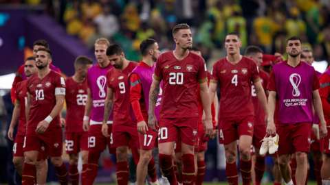 Serbia football team following their World Cup defeat by Brazil