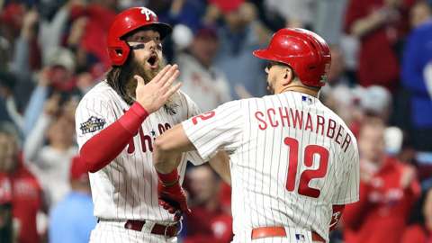 Philadelphia Phillies' Brandon Marsh and Kyle Schwarber celebrate a home run
