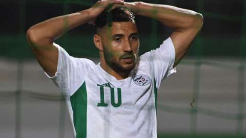 Youcef Belaili reacts during Algeria's defeat by Cameroon
