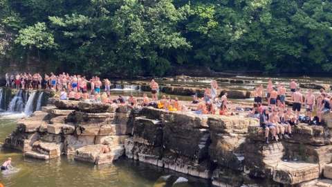 Revellers at Richmond Falls in the heatwave