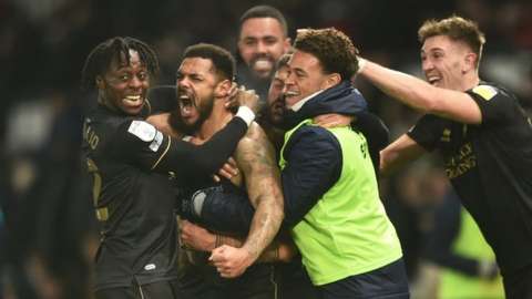 QPR celebrate their winning goal against Derby