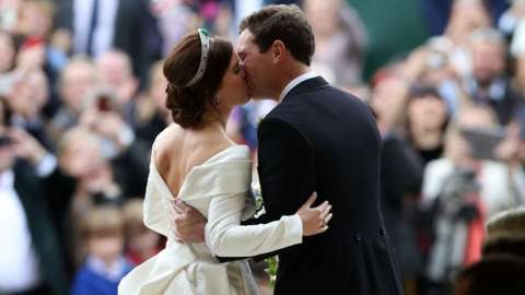Princess Eugenie and Jack Brooksbank kiss outside St George's chapel